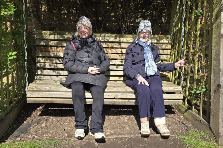 Jo and Margaret enjoying a rest on the swinging seat.